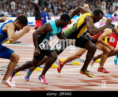 London, Großbritannien. 4. August 2017. Usain Bolt aus Jamaica (R) zusammen mit Warren Fraser von den Bahamas und Hassan Taftian aus dem Iran die Männer 100 Meter Qualifikant bei den Weltmeisterschaften 2017 London in der Leichtathletik bei den Olympischen Stadion in London, Großbritannien, 4. August 2017 ab. Foto: Rainer Jensen/Dpa/Alamy Live-Nachrichten Stockfoto