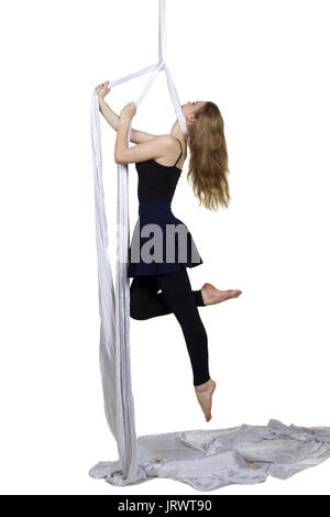 Pretty Woman - luftakrobat, akrobatische Tricks auf Antenne Seide Stockfoto