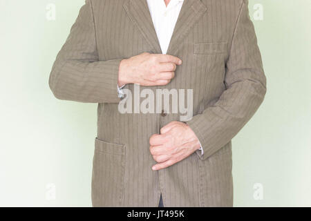 Business Training Konzept. Foto für Ihr Design. Hände Befestigung der Knöpfe. Ihr Budget schont Stockfoto
