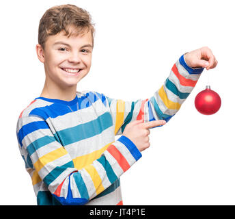 Jugendlich Junge mit Christmas Ball Stockfoto