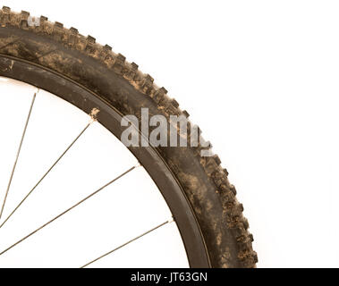 Nahaufnahme einer schmutzigen Mountainbike Reifen Stockfoto