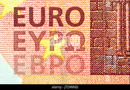 10 €-Banknote Detail steht das Wort "Euro" in drei Alphabete - Roman (Latein), Griechisch und Kyrillisch Stockfoto