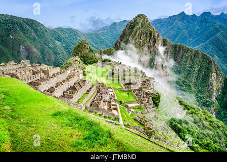 Machu Picchu, Peru - die Ruinen von Inca Empire City und Huaynapicchu Berg, das Heilige Tal, Cusco. Fantastischer Ort von Südamerika. Stockfoto