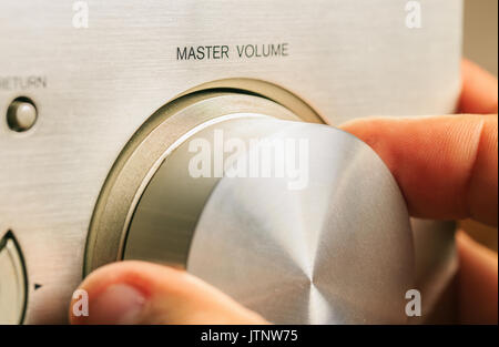 Einstellen der Lautstärke der Musik Stockfoto