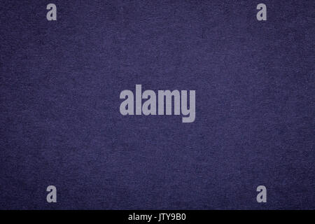 Textur von Old navy blau Papier Hintergrund, closeup. Struktur der dichten dunklen denim Kraftpapier Pappe. Stockfoto