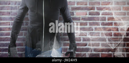 Räuber mit schwarzen Hoodie gegen abstrakte schwarzer Hintergrund Stockfoto