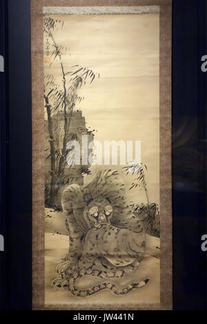 Ein traditionelles japanisches Gemälde von Soga Shohaku, das den mythischen Drachen und Tiger in einer dynamischen Komposition darstellt, die japanische künstlerische Stile des späten 18. Jahrhunderts widerspiegelt. Stockfoto