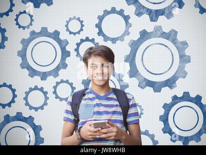 Digital composite der Studentischen holding Telefon vor Einstellungen Zahnräder Cog Stockfoto