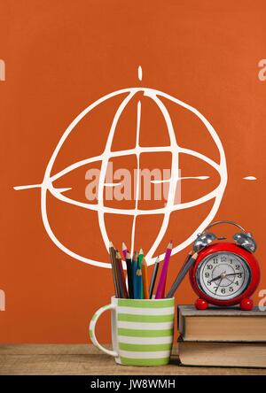 Digital composite der Bücher auf den Tisch gegen orange Tafel mit Bildung und Schule Grafiken Stockfoto