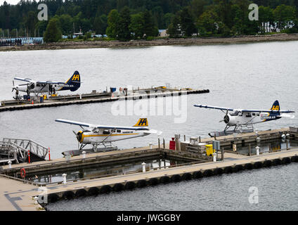 Harbour Air wasserflugzeuge an der Anlegestelle Plattformen auf Wasser in Vancouver British Columbia Kanada angedockt Stockfoto