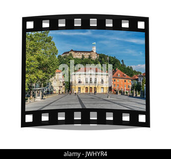 Die Slowenische Philharmonie ist auf dem Platz Kongresni trg entfernt. Im Hintergrund ist die mittelalterliche Burg von Ljubljana, Slowenien, Europa Stockfoto