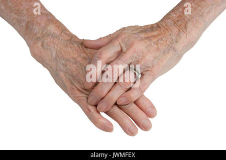 Die Hände von einer älteren Frau isoliert auf weiss Stockfoto