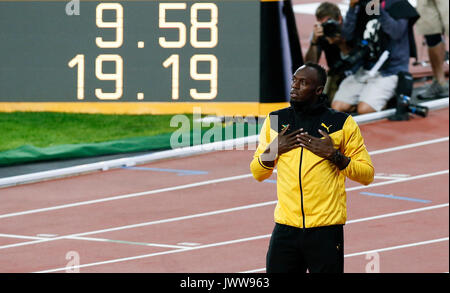 London, Großbritannien. 13 Aug, 2017. Usain Bolt aus Jamaika reagiert vor dem Timer seine zwei Weltrekorde Anzeigen am 10. Tag des IAAF World Championships 2017 in London Stadion in London, Großbritannien, am 12.08.13., 2017. Credit: Han Yan/Xinhua/Alamy leben Nachrichten Stockfoto