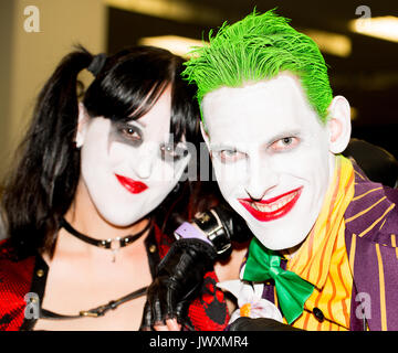 Paar gekleidet als Harley Quinn und der Joker aus Batman Comics an der London Film and Comic Con 2017 (Presse/Erlaubnis eingeholt). Stockfoto