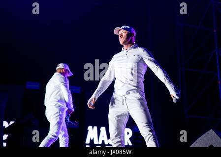 BENICASSIM, Spanien - 14 JUL: Major Lazer (elektronische Musikband bestehend aus Produzent Diplo, Jillionaire und Walshy Fire) führen im Konzert in F Stockfoto