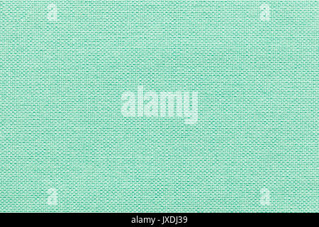 Hellgrüner Hintergrund aus einem Textilmaterial mit Korbmöbeln Muster, Nahaufnahme. Struktur der Pastell türkis Stoff mit natürlichen Textur. Tuch zurück Stockfoto