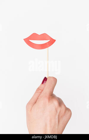 Weibliche Hand, Lippen Photo Booth Prop Stockfoto