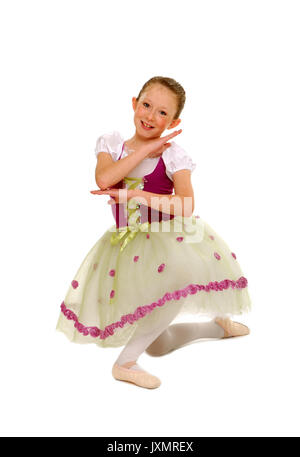 Eine lächelnde junge Ballerina Mädchen in einer Pose Stockfoto