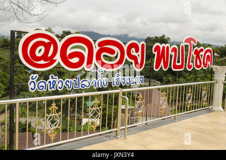 Anmelden Thai am Wat Huai Pla Kung 9 Stufe Tempel, Chiang Rai Thailand Stockfoto