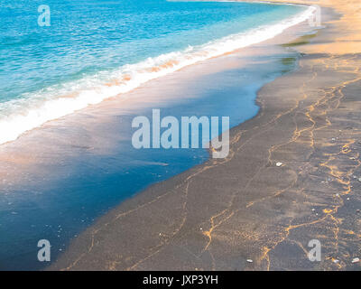 Black Sand Beach in Insel Bali in Indonesien Stockfoto