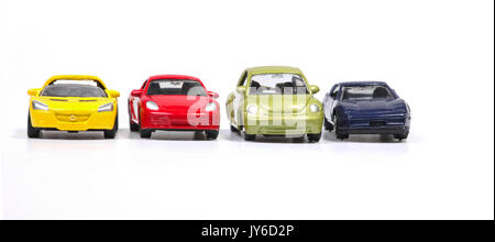 Spielzeugautos in einer Reihe Stockfoto