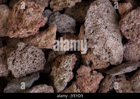 Makro Foto von roten vulkanischen Lavasteinen. Hochauflösendes Foto. Stockfoto