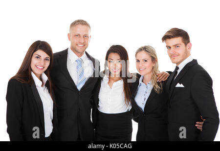 Porträt von gut Geschäftsleute zusammenstehen auf weißen Hintergrund Stockfoto
