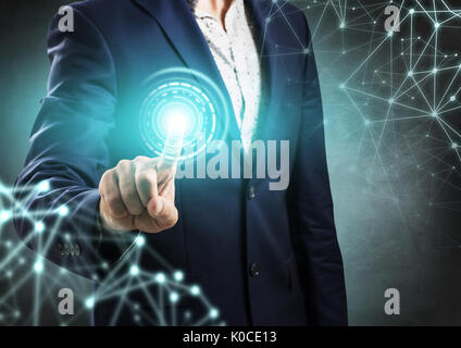 Geschäftsmann auf digitale blaues Licht. Stockfoto