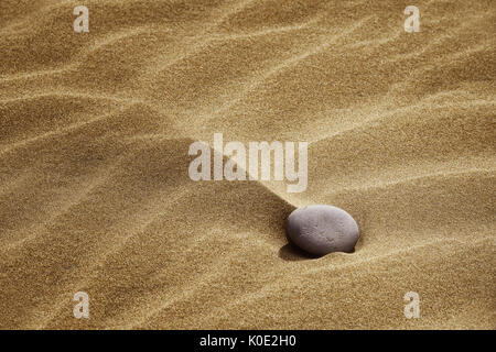 Stein in der Wüste Sand. Stockfoto