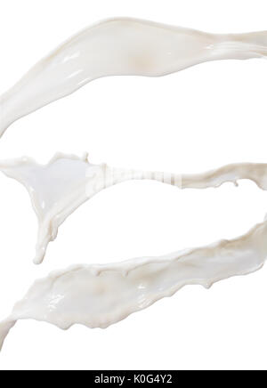 Milch spritzt auf einem weißen Hintergrund. Stockfoto