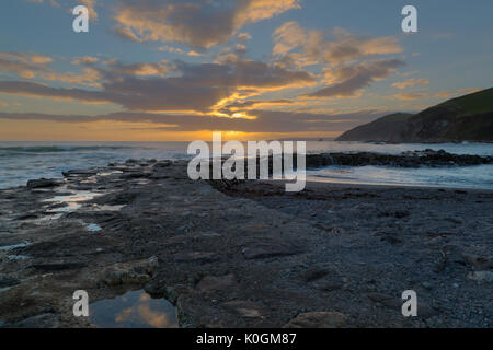 Sonnenuntergang am Portwrinkle in South East Cornwall Stockfoto