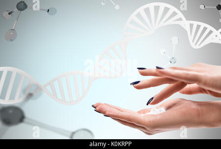 Weibliche Hände mit Sahne über DNA und Moleküle. Stockfoto