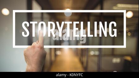Digital composite von Hand Interaktion mit storytelling business Text gegen den Hintergrund verschwommen Stockfoto