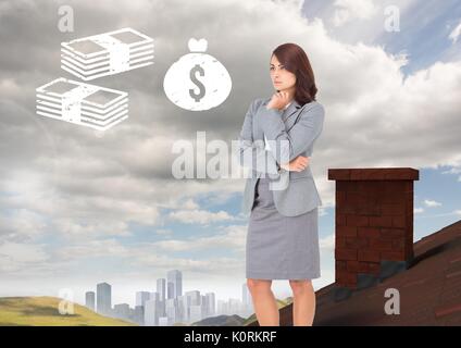 Digital composite Geld Symbole und Geschäftsfrau auf Dach mit Kamin im Land mit einer Stadt in der Ferne Stockfoto