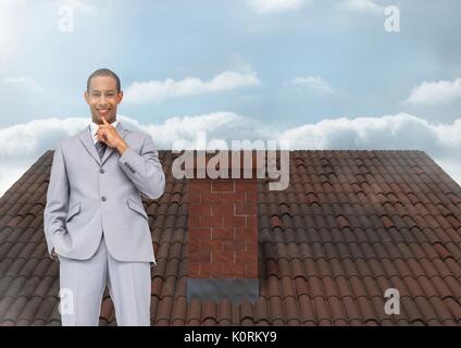 Digital composite der Geschäftsmann auf Dach mit Kamin und Sky Stockfoto