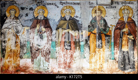 Berg Athos, Griechenland - 27. März 2017: verbrauchtes Fresken von Heiligen auf die Außenseite der Kirche von Protaton in karyes, Berg Athos Stockfoto