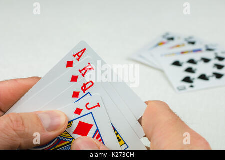 Die Karten im Poker. Eine Karte mehr - wird ein Royal Flush. Stockfoto