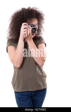 Schöne Frau mit einem Vintage-Kamera, isoliert auf weißem Hintergrund Stockfoto