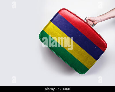 Mauritius Flagge auf einem Vintage Leder Koffer. Stockfoto