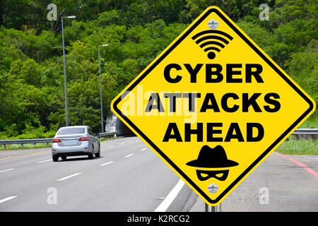 Cyber-angriffe vor gelb Warnung Schild. Stockfoto