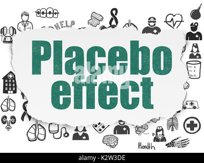 Gesundheitskonzept: Placebo-Effekt auf Torn Paper-Hintergrund Stockfoto