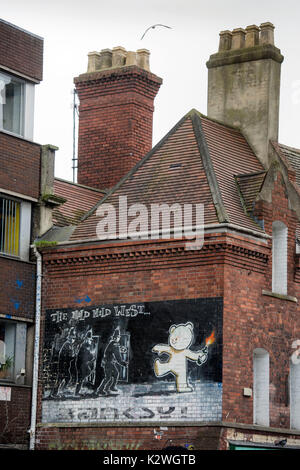 Banksys "mild Milde Westen' Kunstwerk auf Stokes Croft, Bristol, Großbritannien Stockfoto