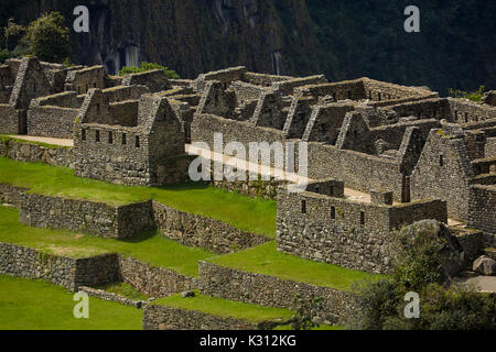 Häuser in Machu Picchu Inka Ruinen aus dem 15. Jahrhundert (Weltkulturerbe), das Heilige Tal, Peru, Südamerika Stockfoto