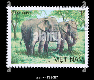 Briefmarke aus Vietnam mit zwei Asain Elefanten. Stockfoto