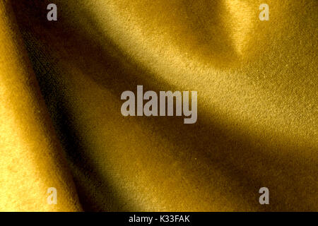 Golden Angoraziege velours Stoff, Samt, gemischt mit Seide Threads. mohair Textil. Kaschmir aus Samt und Wildleder chamois Wirkung. Für u Stockfoto