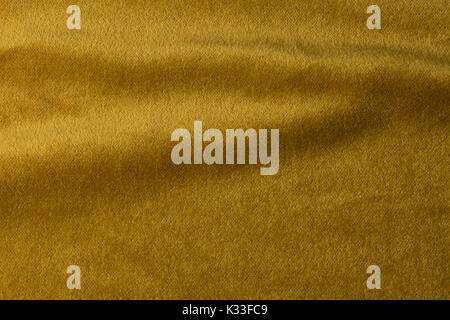 Golden Angoraziege velours Stoff, Samt, gemischt mit Seide Threads. mohair Textil. Kaschmir aus Samt und Wildleder chamois Wirkung. Für u Stockfoto