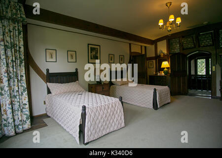 Ein Gast Schlafzimmer am 67 Zimmer Coe Halle an der Bepflanzung Felder Arboretum in Oyster Bay, Long Island, New York. Stockfoto