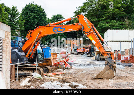 Orange earthmover, Sanierung von alten Ashmount Schule Website, Islington, London, UK Stockfoto