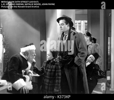 Wunder auf 34 TH STREET L-R, Edmund Gwenn, Natalie Wood, John Payne Stockfoto