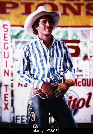 8 SEKUNDEN LUKE PERRY ALS LANE FROST Datum: 1994 Stockfoto